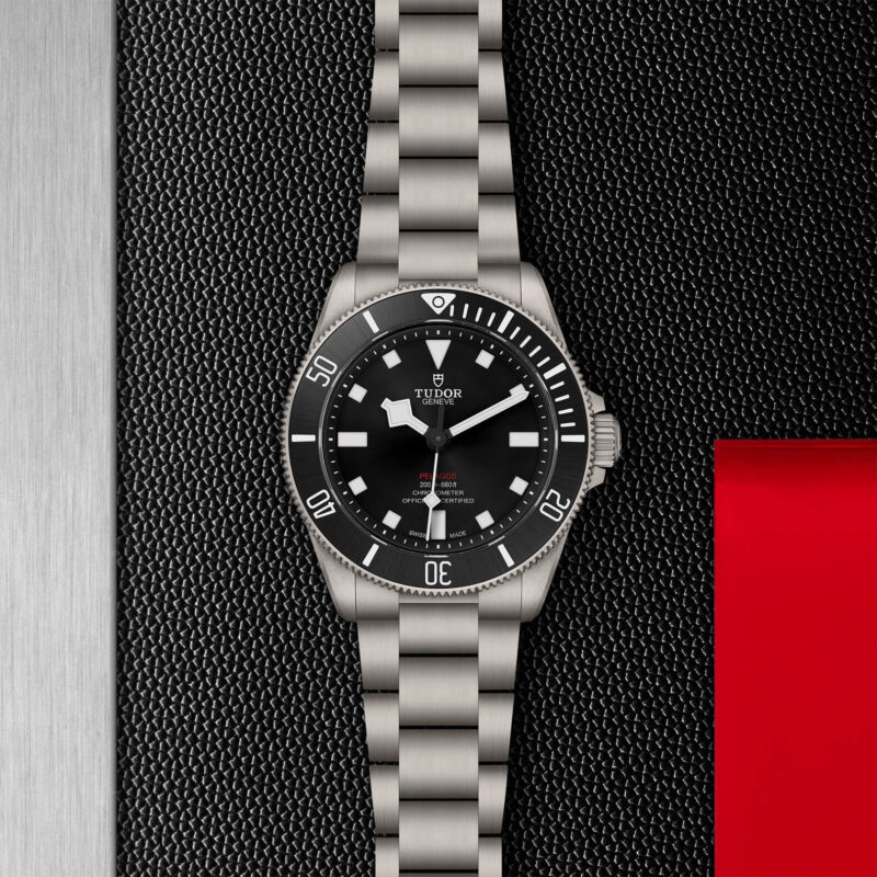 A M25407N-0001 watch on a red and black background.