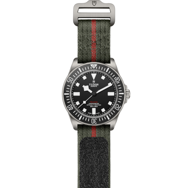 The M25717N-0001 watch with a red and green strap.