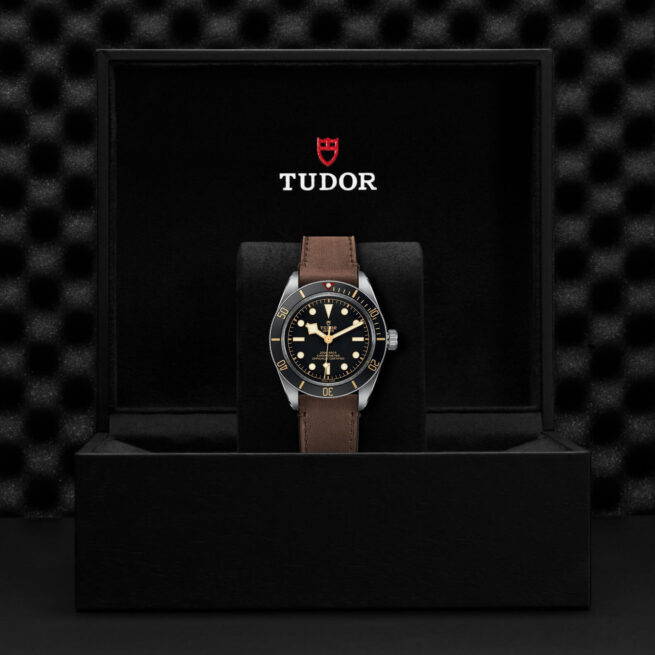 The M79030N-0002 watch in a black box.