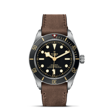 The M79030N-0002 watch with brown leather strap.