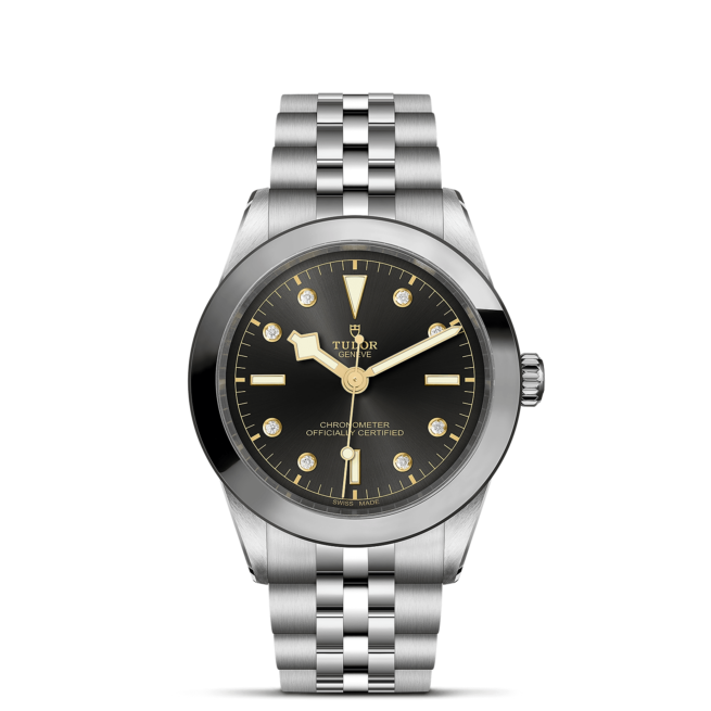 The M79660-0004 watch on a black background.