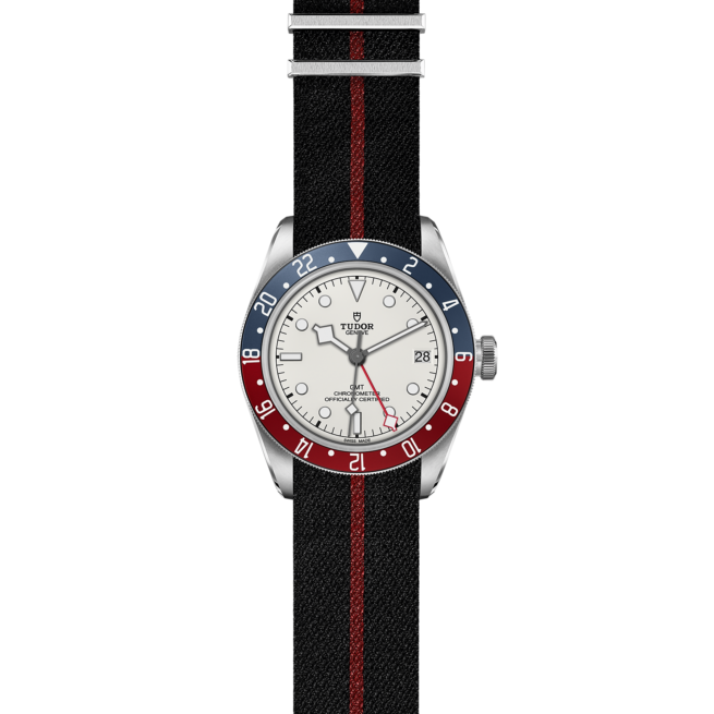 A M79830RB-0012 watch with a red, white and blue strap.