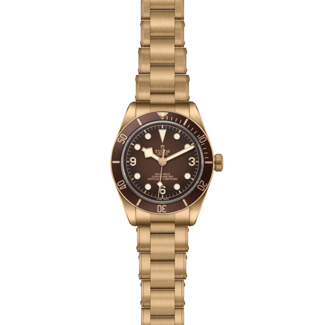 A M79012M-0001 watch in gold on a black background.