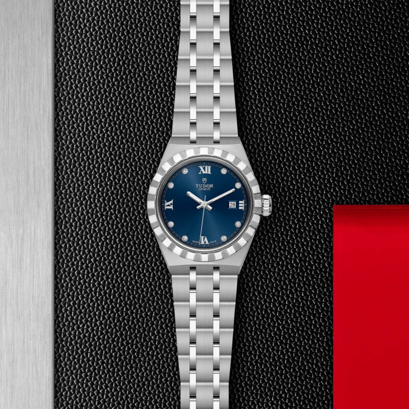 A M28300-0007 with a blue dial on a black background.