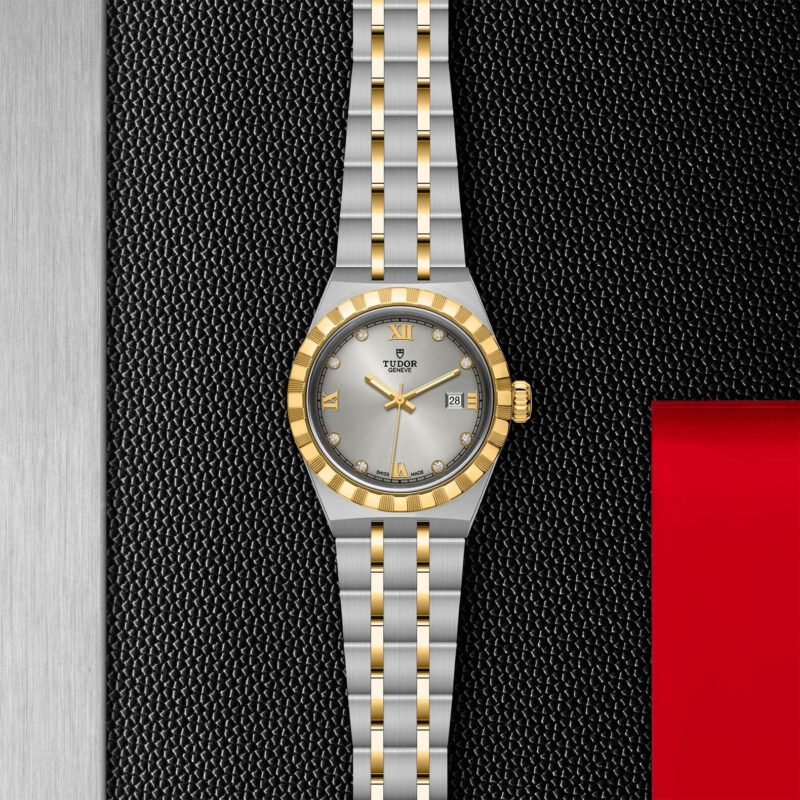 A M28303-0002 women's watch on a black background.