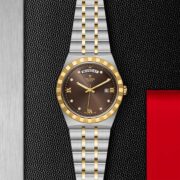A M28603-0008 watch on a black background.