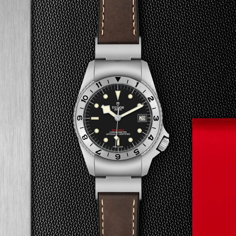 The M70150-0001 watch on a black leather strap.