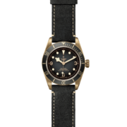 A M79250BA-0001 with a black leather strap.