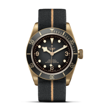 The M79250BA-0002 watch with gold and black dial.