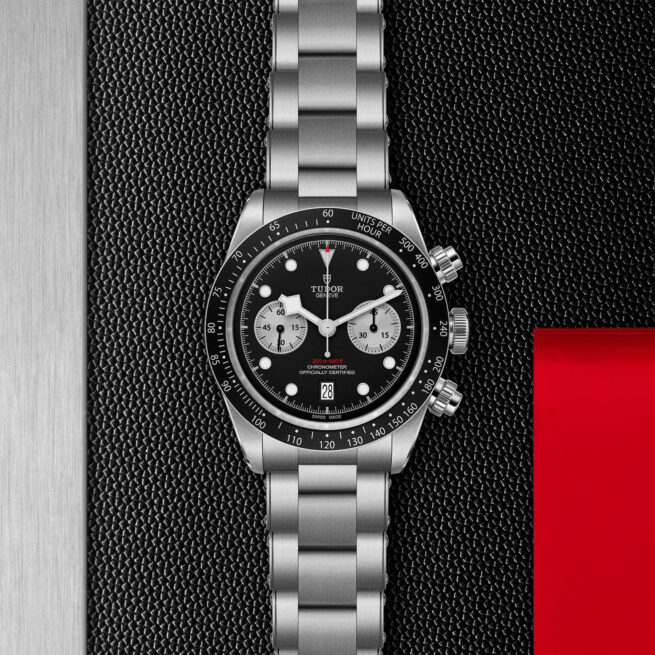 The M79360N-0001 tachymeter chronograph on a black background.