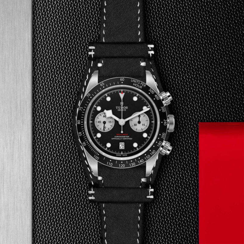A black and red watch on a black leather strap, the M79360N-0005.