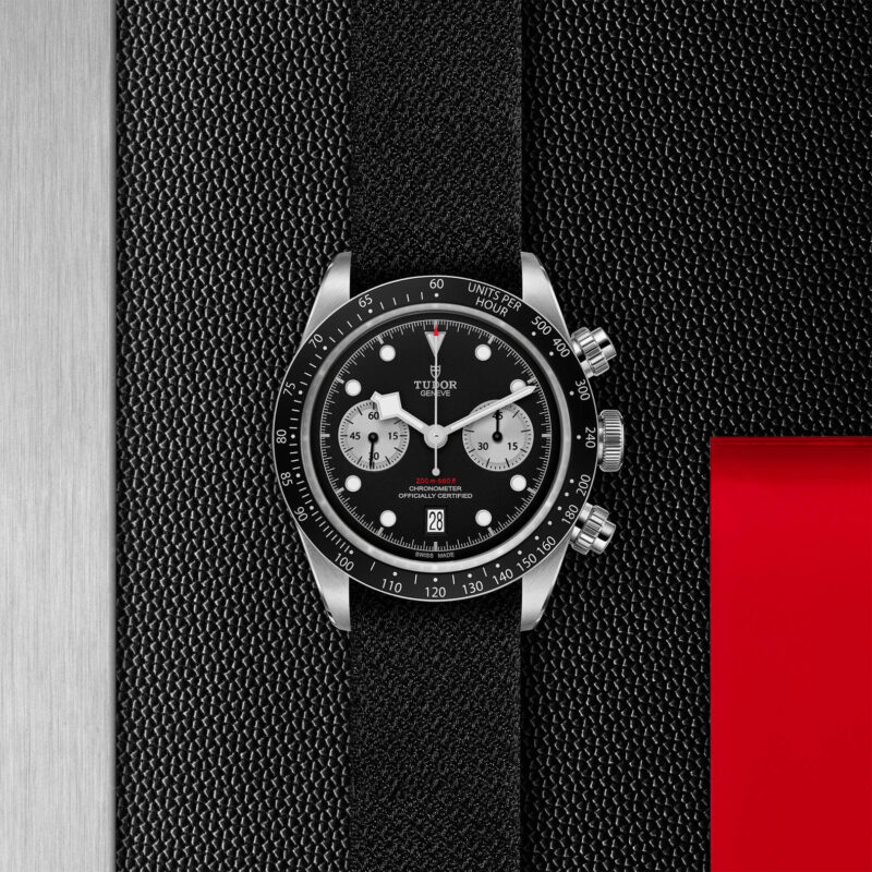 The M79360N-0007 chronograph is displayed on a black leather strap.