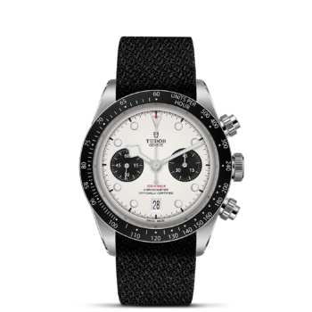 A M79360N-0008 with a white dial and black strap.