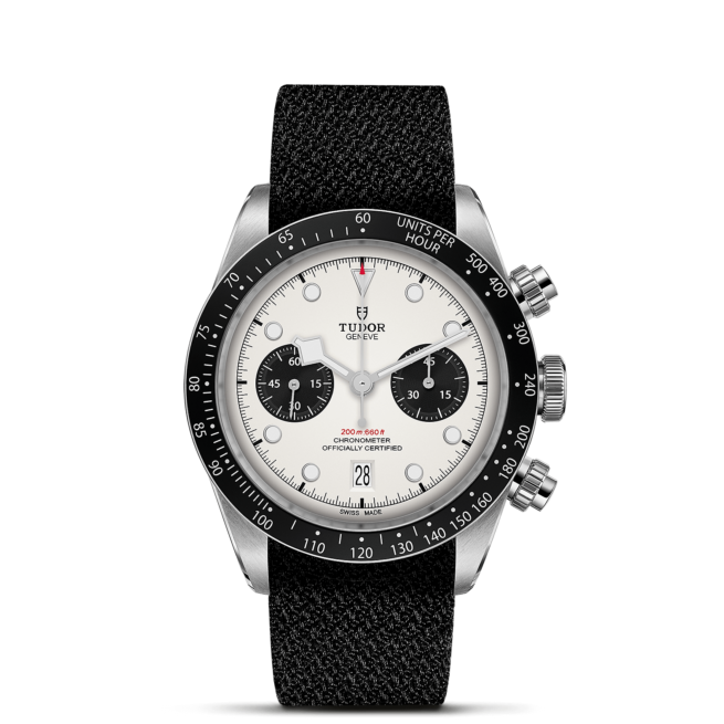 A M79360N-0008 with a white dial and black strap.