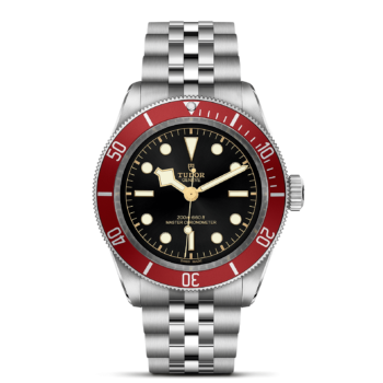 A tudor M7941A1A0RU-0003 watch with red bezel.