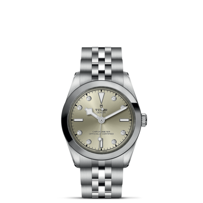 A M79600-0006 watch with a yellow dial.