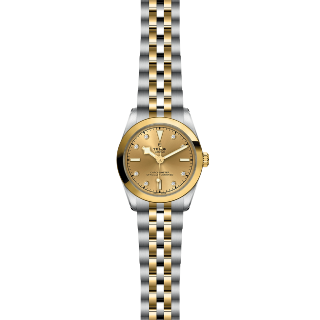 The M79603-0008 ladies watch with a yellow gold and silver dial.