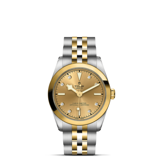 A M79603-0008 watch with a yellow gold dial.