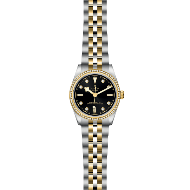 A Rolex M79613-0005 ladies watch with a black dial and diamonds.