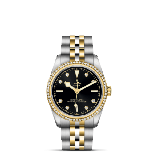 A M79613-0005 watch with a black dial and diamonds.