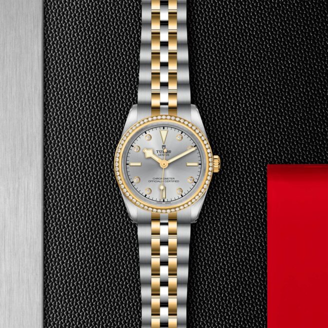 A M79613-0006 ladies watch on a black background.