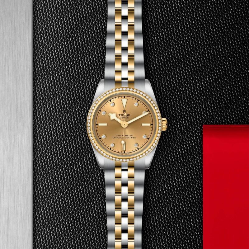 A Rolex ladies watch (M79613-0007) on a black leather strap.