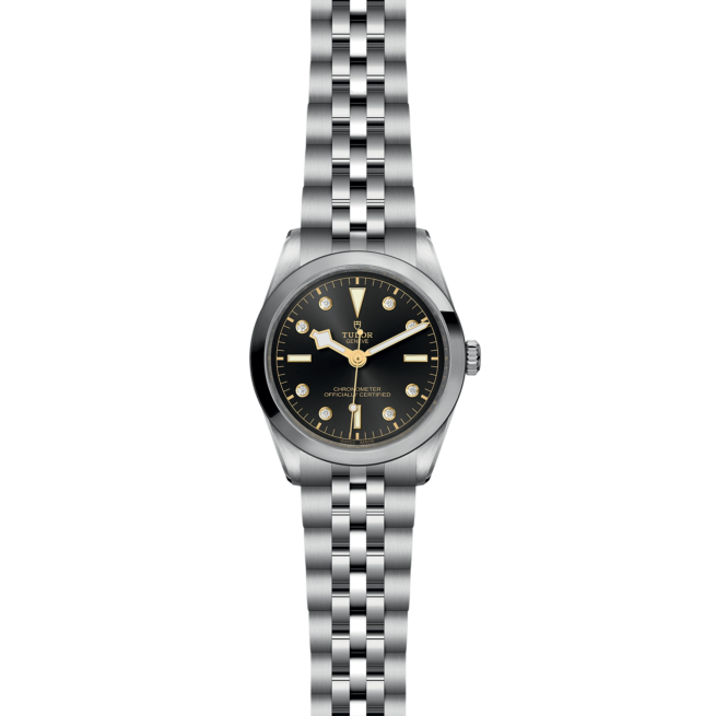 A M79640-0004 black dial watch on a black background.