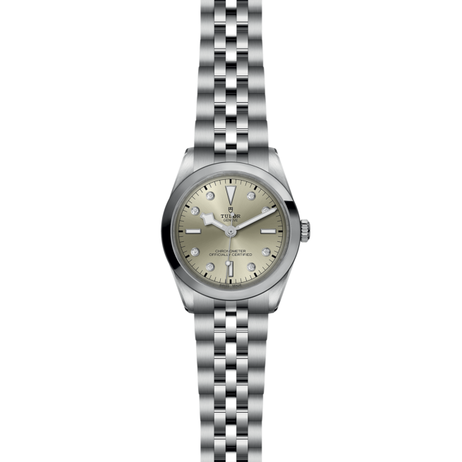A M79640-0006 watch with a silver dial on a black background.