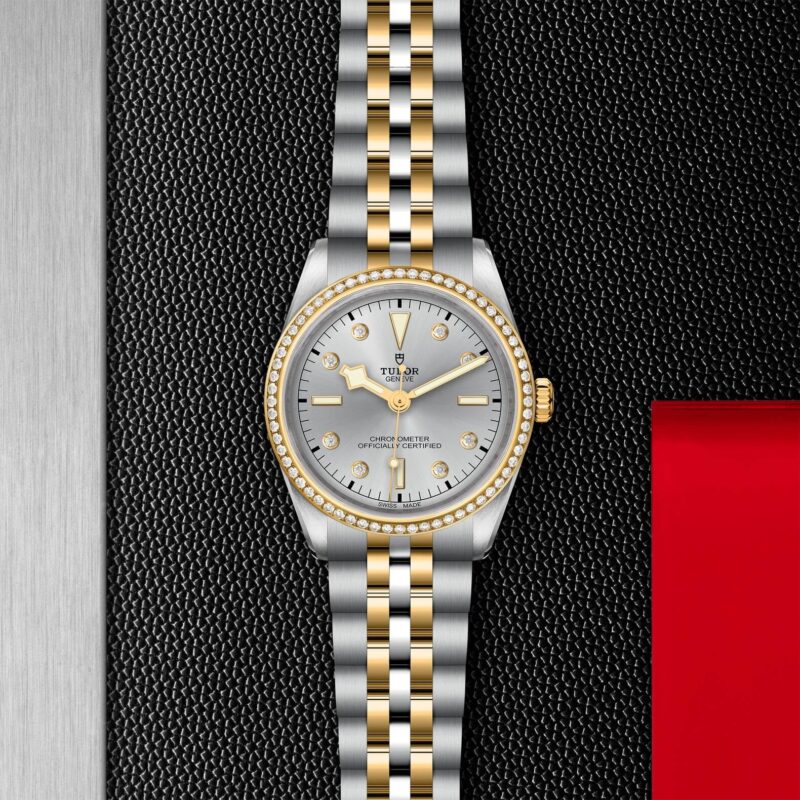 A M79653-0006 ladies watch on a black background.