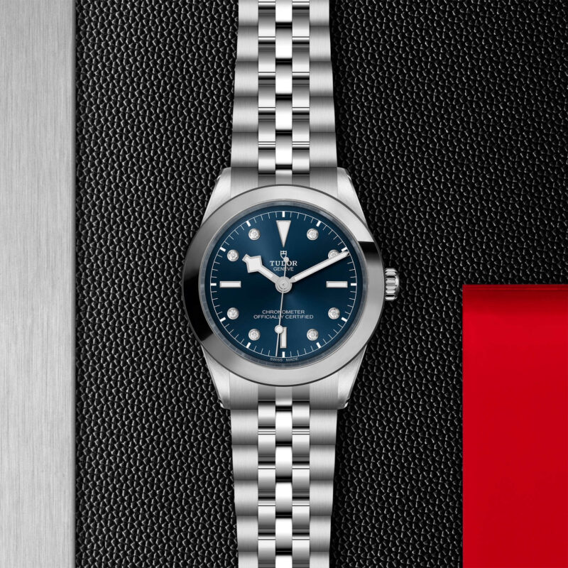 A watch with a M79660-0005 dial on a black background.