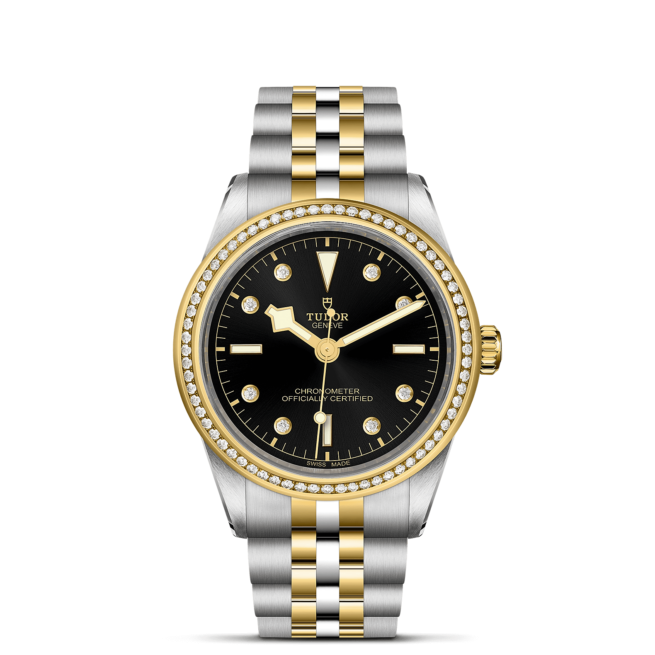 A M79673-0006 tudor black bay watch with two tone gold and diamonds.