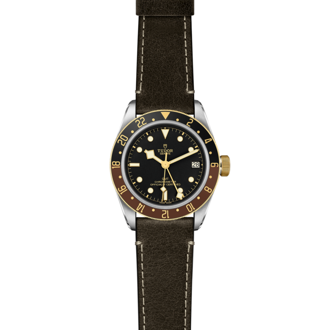 The M79833MN-0003 watch with a brown leather strap.