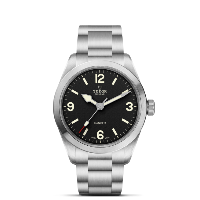 A M79950-0001 watch with black dials on a black background.