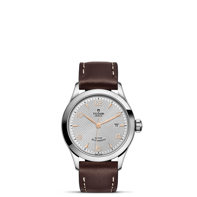 A watch with brown leather straps on a black background. Product Name: M91350-0006