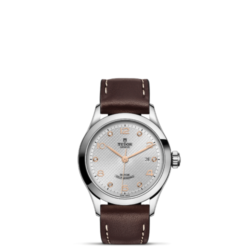 A watch with brown leather straps on a white background.Product Name: M91350-0007