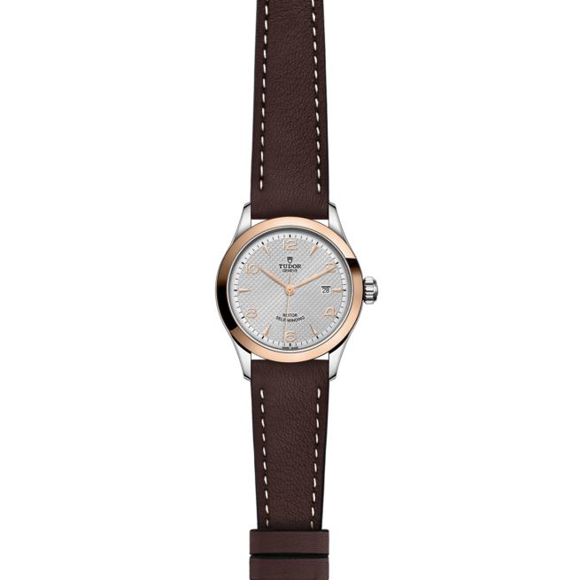 A women's watch with a brown leather strap, like the M91351-0005.