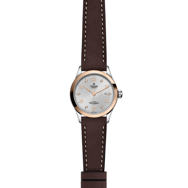 A women's watch with a M91351-0006 leather strap.
