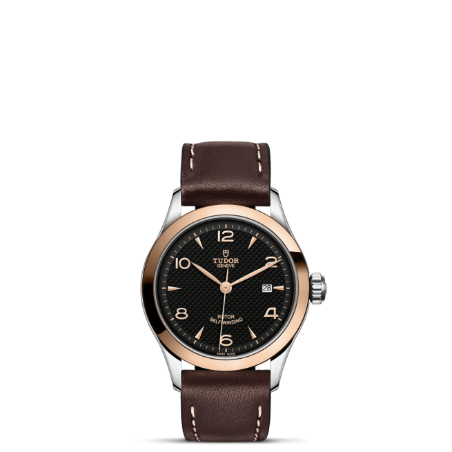 A watch with brown leather straps on a black background.Product Name: M91351-0007