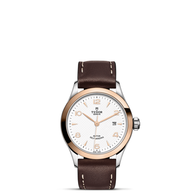 The M91351-0010 watch with brown leather strap.