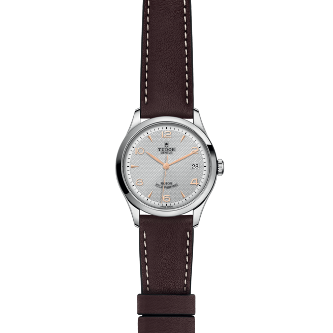 A watch with a brown leather strap on a black background, the M91450-0006.