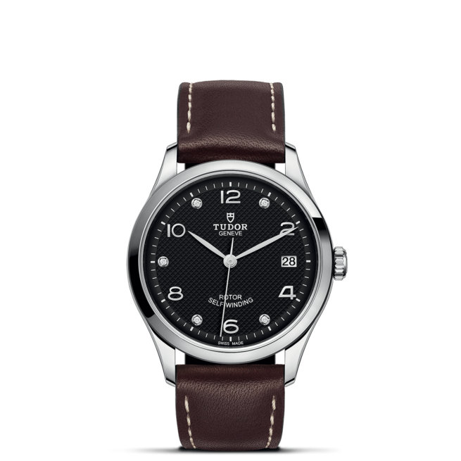 A M91450-0009 with brown leather straps on a black background.