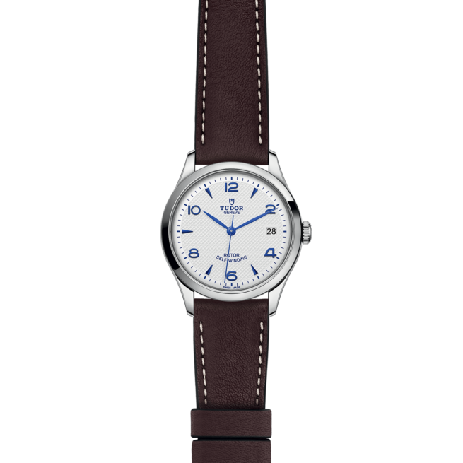 A M91450-0010 with a white dial and brown leather strap.