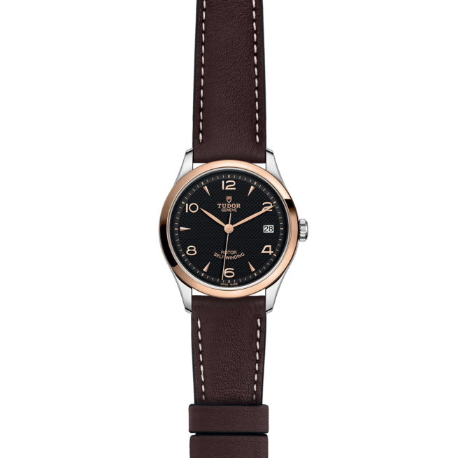 A watch with brown leather straps on a black background, the M91451-0007.