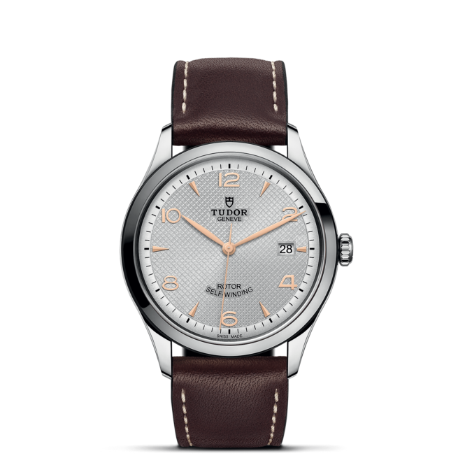A M91550-0006 watch with brown leather straps.