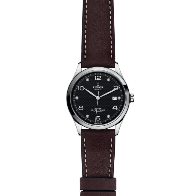 A M91550-0009 with a brown leather strap on a black background.