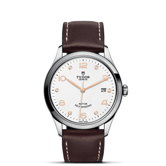 The M91550-0014 tasmanian classic watch on a brown leather strap.