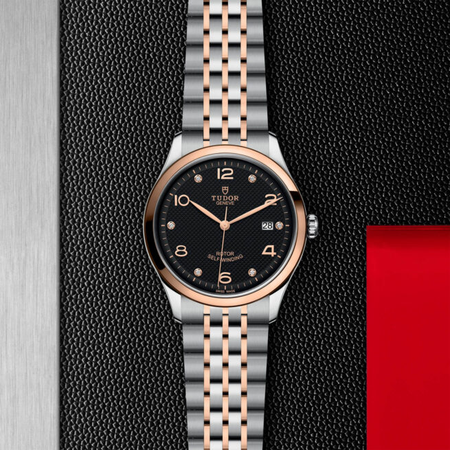 A M91551-0004 watch on a red background.