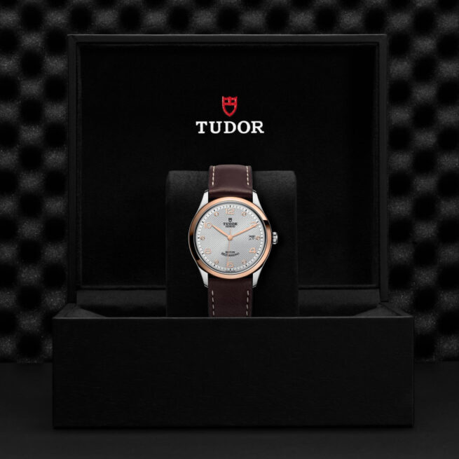 A tudor watch in a black box.