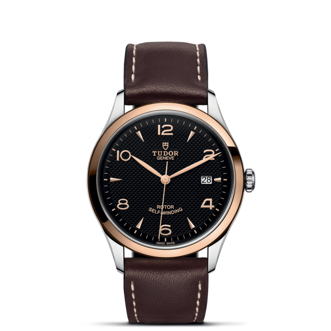 Tissot men's watch with brown leather strap.