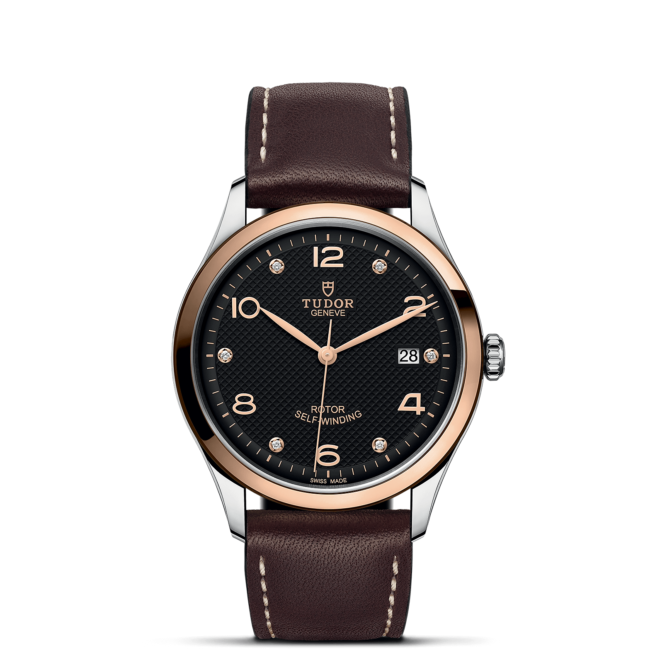 Tissot men's watch with brown leather strap.